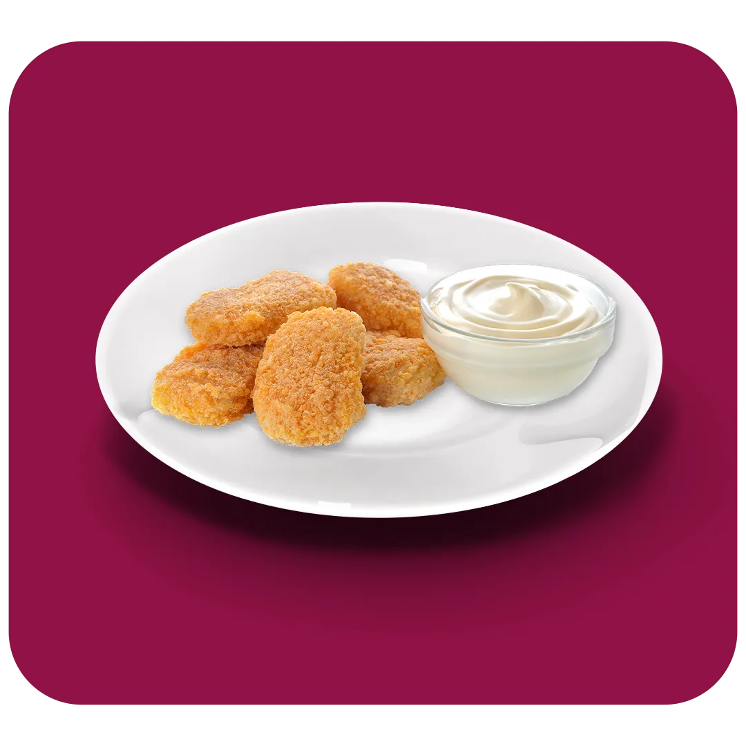 Nuggets de poulet dorés et croustillants, parfaits pour une pause gourmande à Versailles